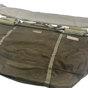 1x Trakker Sanctuary Sling in Stink Sleeve - WHI648 - PRE LOVED